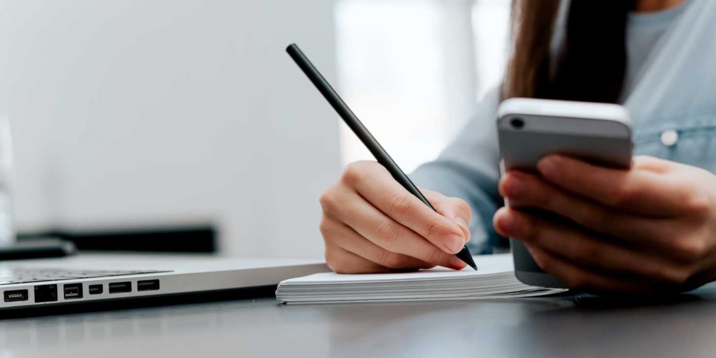writing whilst holding phone